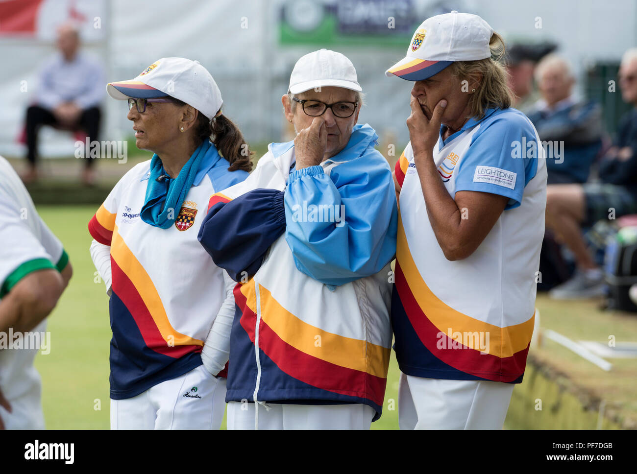 Players having a discussion in the triples final at the national women`s lawn bowls championships, Leamington Spa, UK Stock Photo